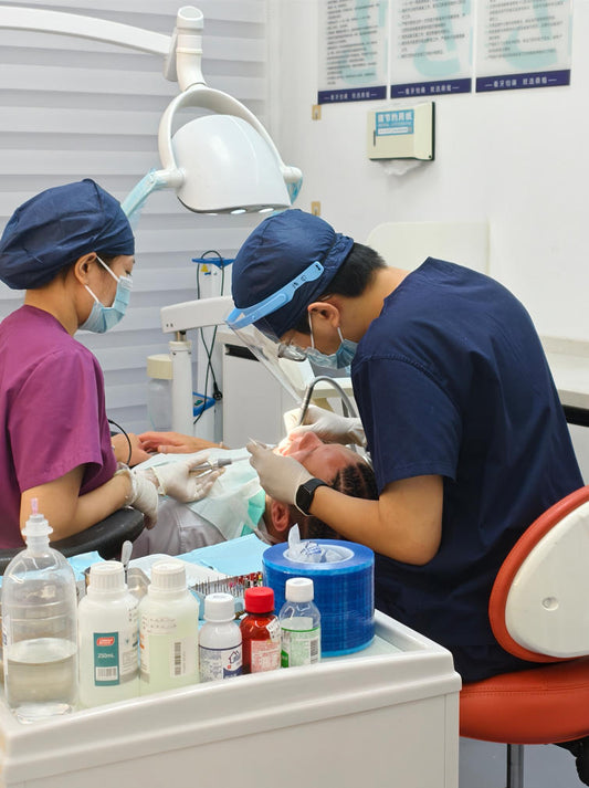 US Gentlemen in Guangzhou Clinic for Root Canal